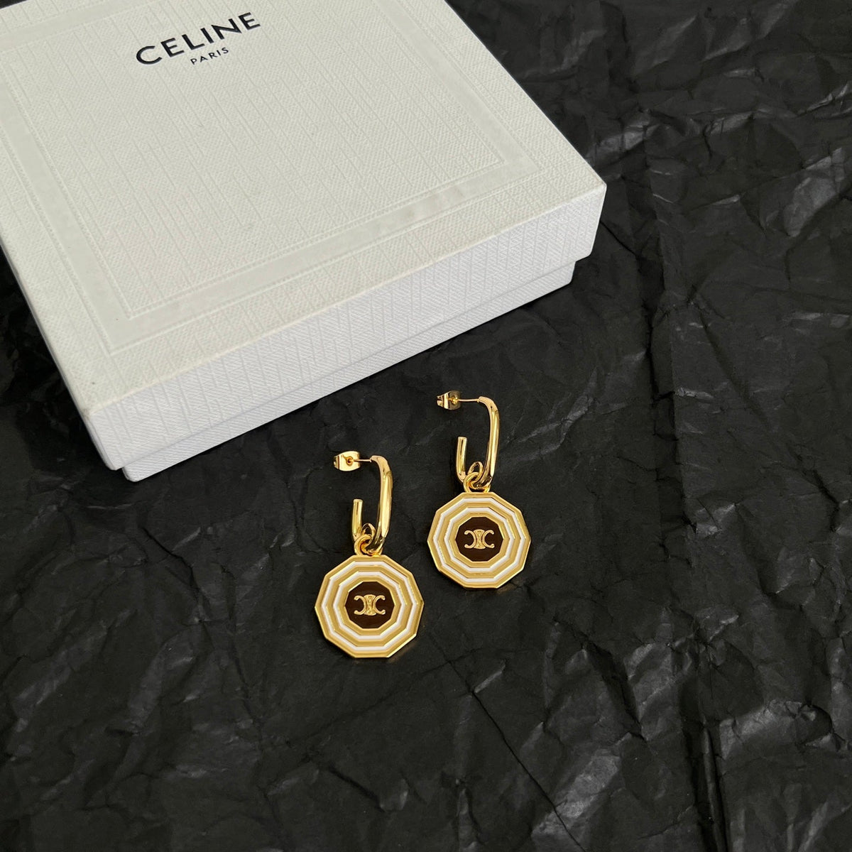 Martin Graham stud earrings in polished metal-tone – main product view