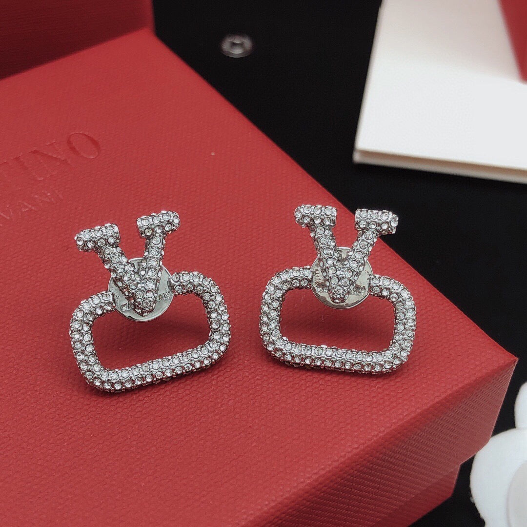 Martin Graham stud earrings in polished metal-tone – main product view