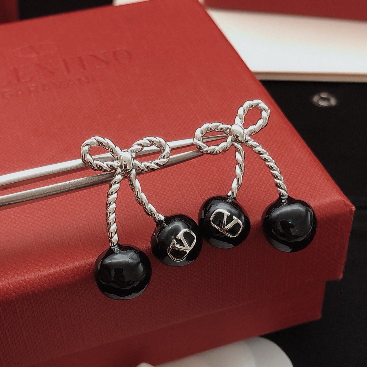 Martin Graham stud earrings in polished metal-tone – main product view