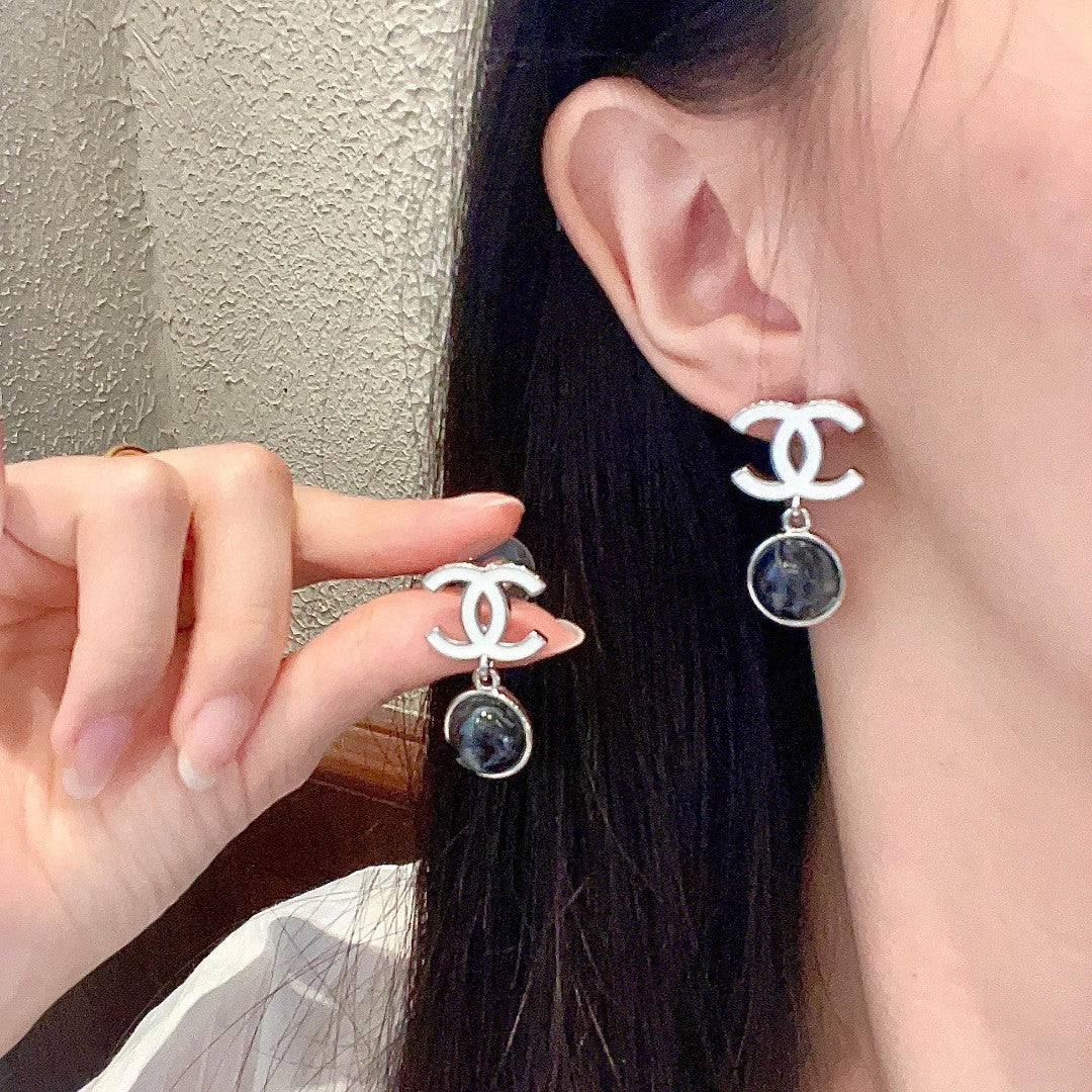 Martin Graham earrings in polished metal-tone – main product view