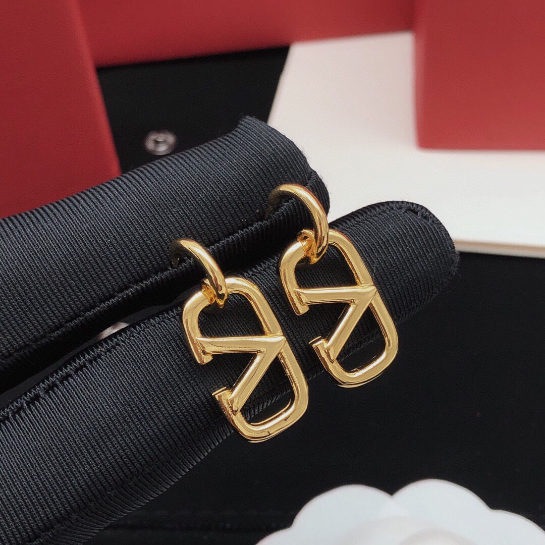 Martin Graham drop earrings in polished metal-tone – main product view