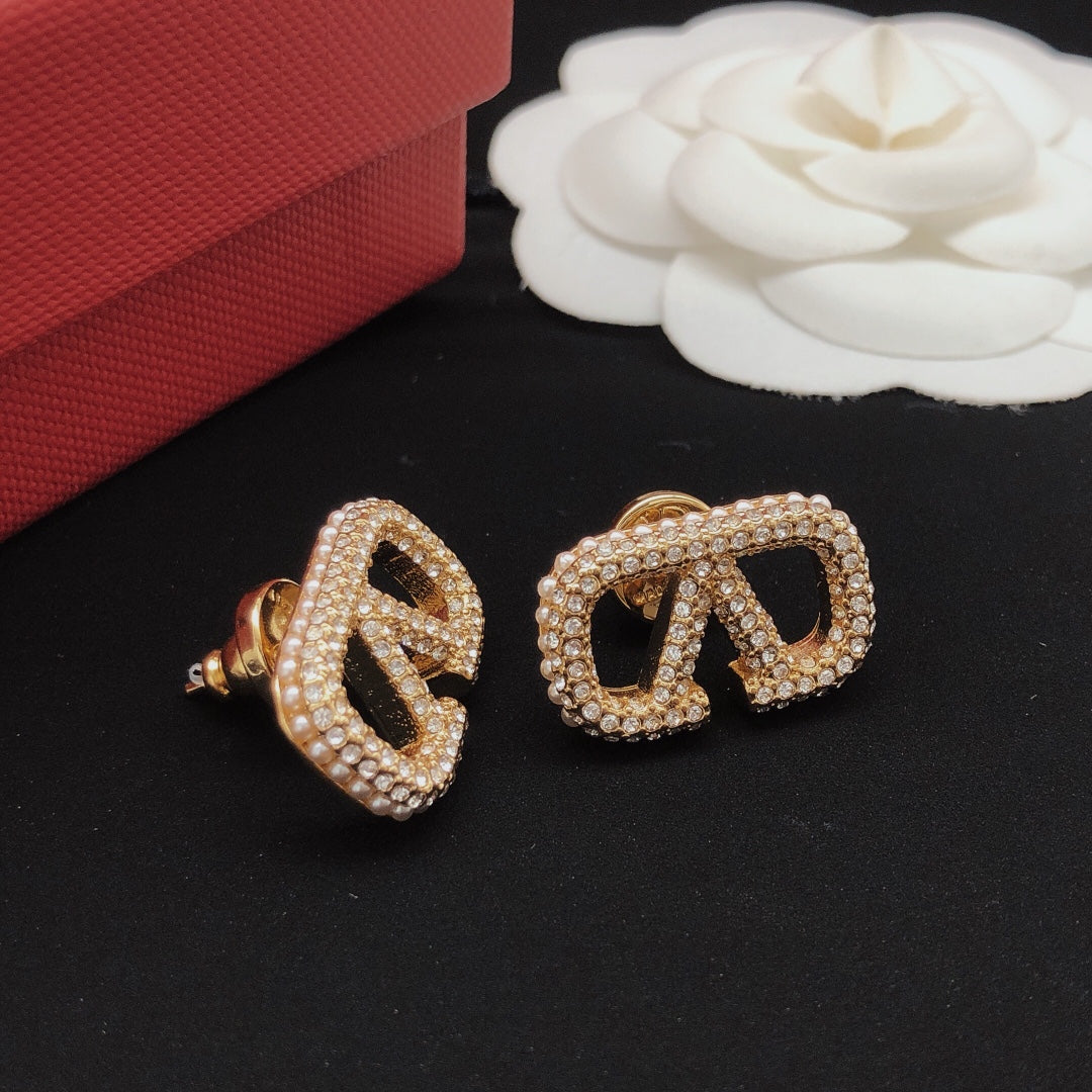 Martin Graham stud earrings in polished metal-tone – main product view