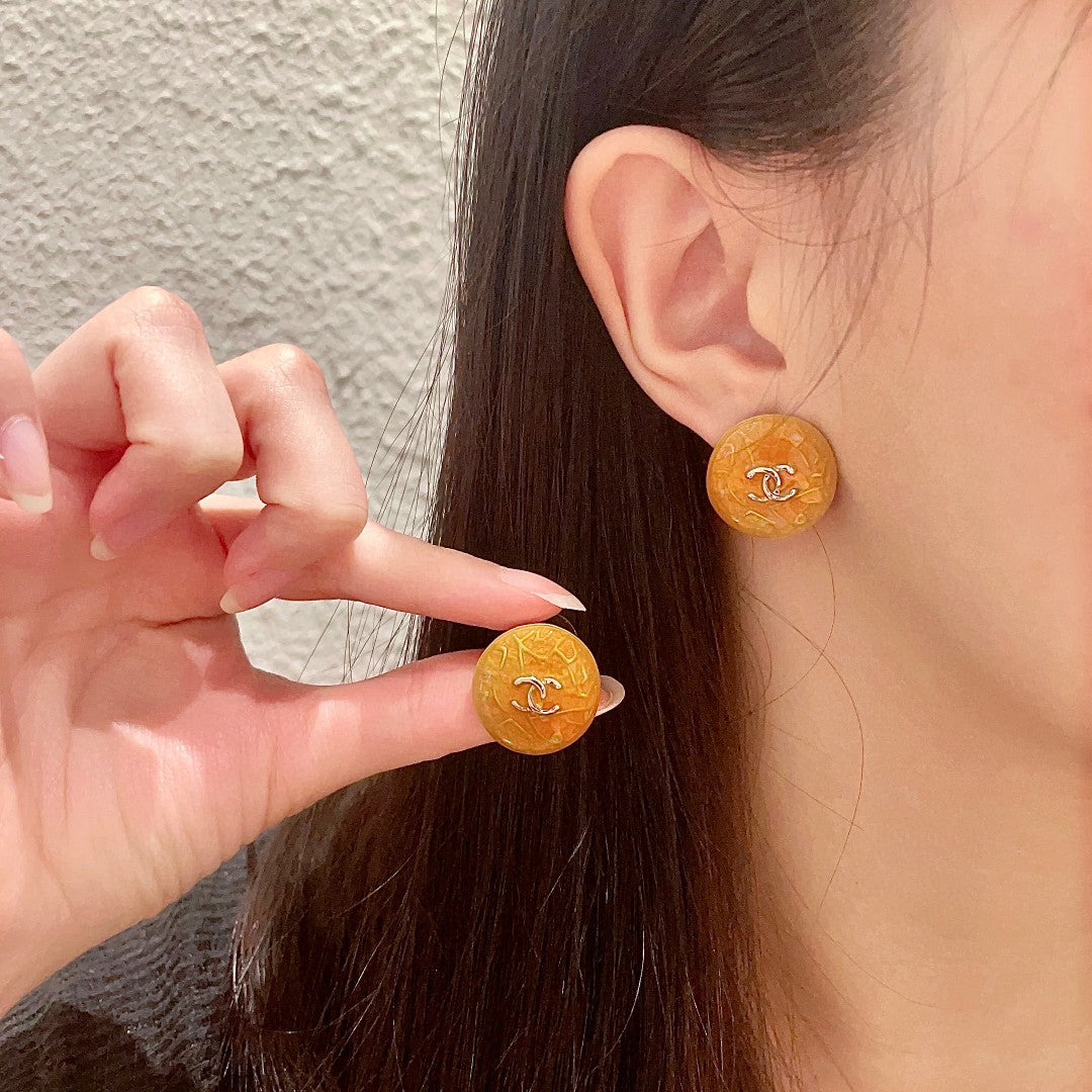 Martin Graham stud earrings in polished metal-tone – main product view