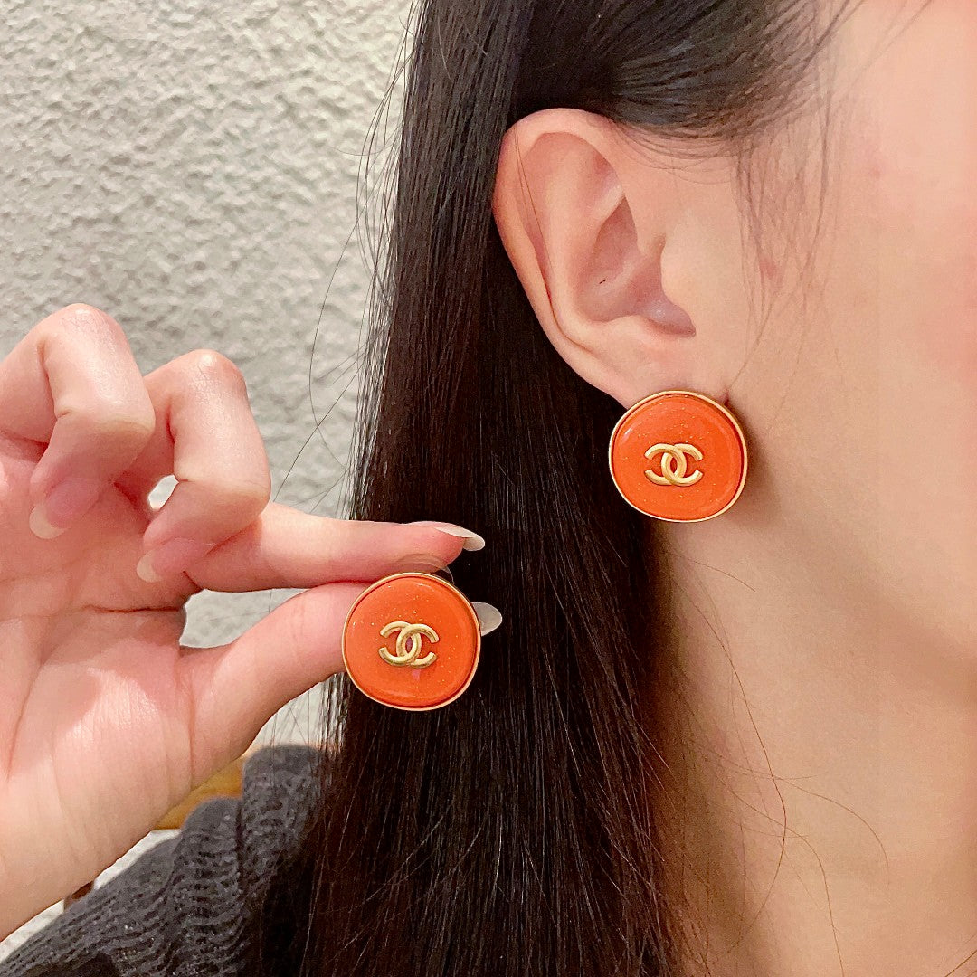 Martin Graham stud earrings in polished metal-tone – main product view