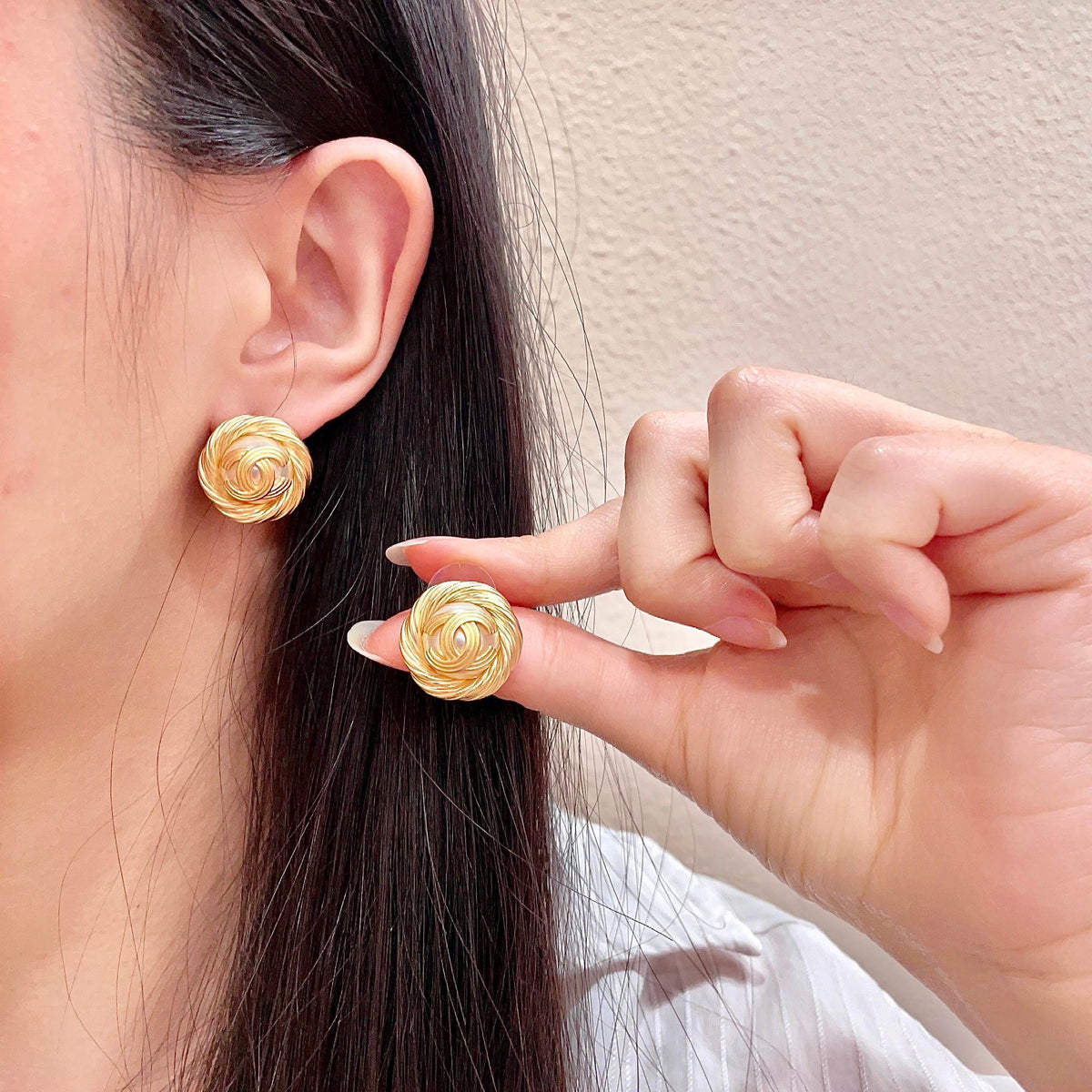 Martin Graham stud earrings in polished metal-tone – main product view