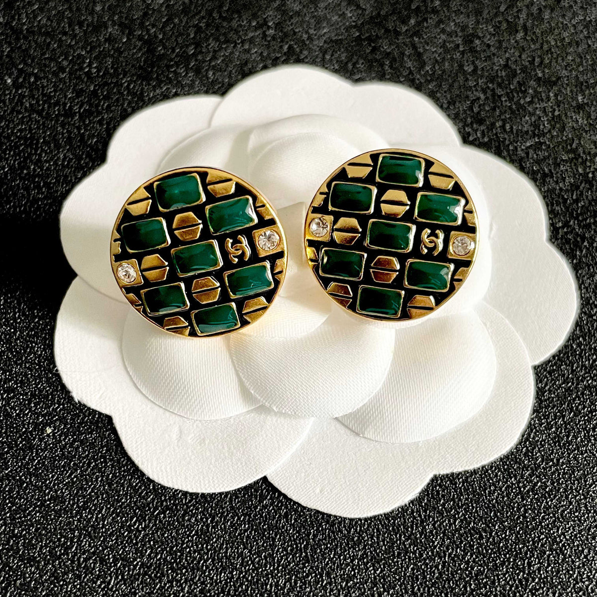 Martin Graham stud earrings in polished metal-tone – front product view