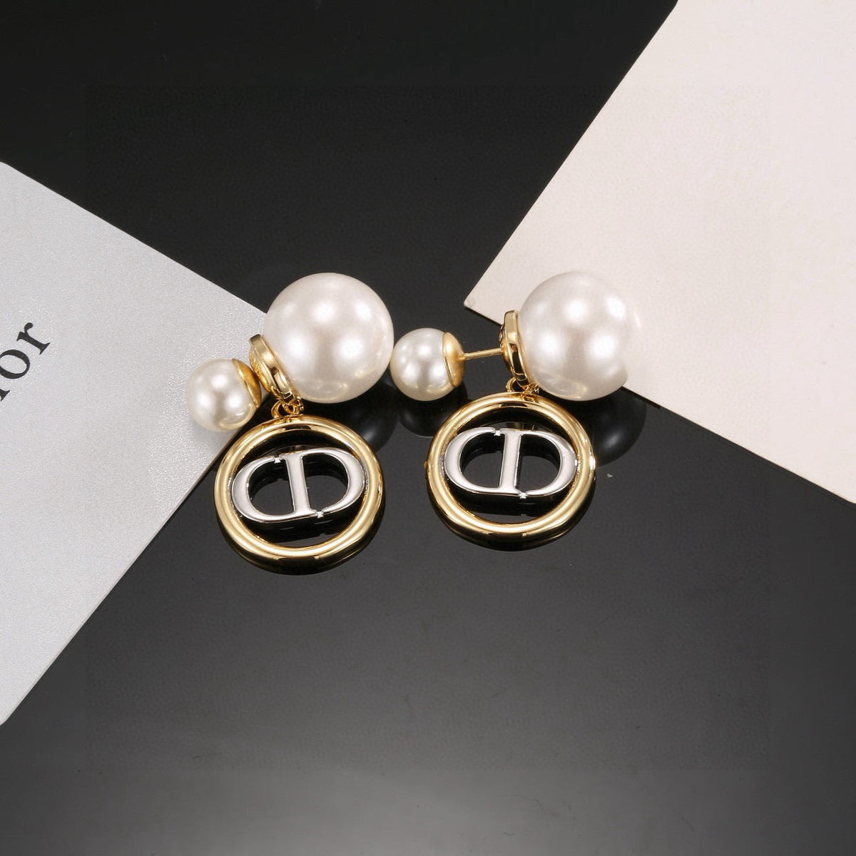 Martin Graham stud earrings in polished metal-tone – main product view