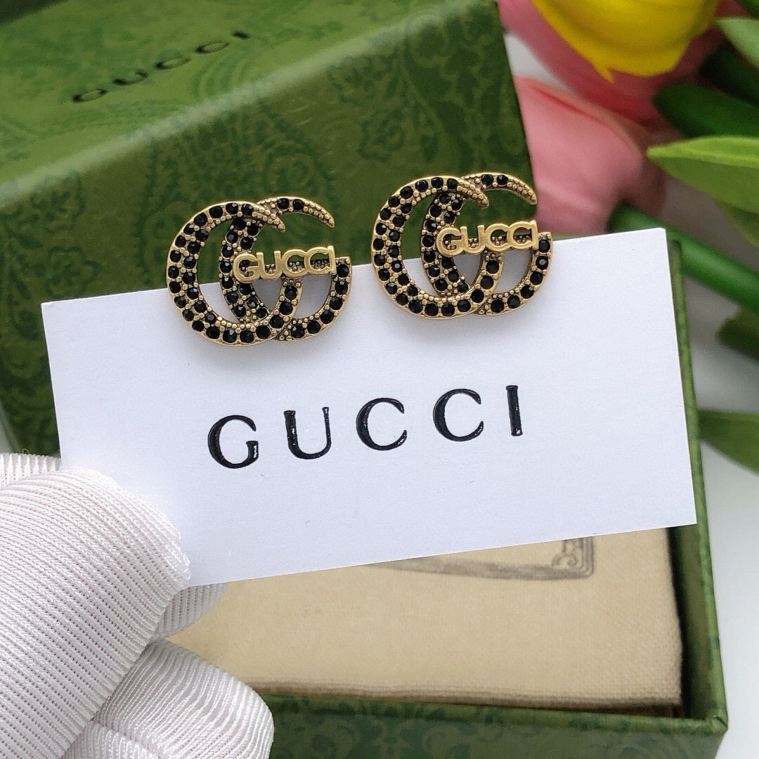 Martin Graham stud earrings in polished metal-tone – main product view