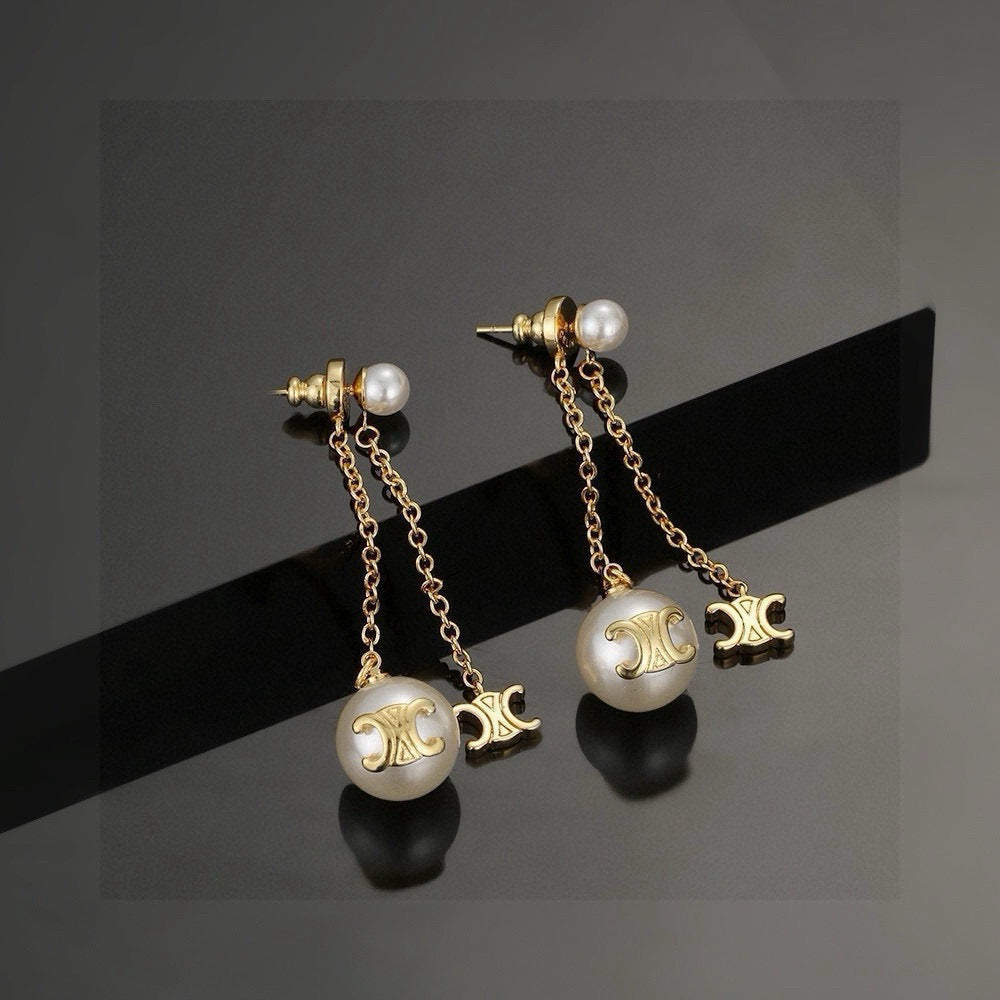 Martin Graham stud earrings in polished metal-tone – main product view
