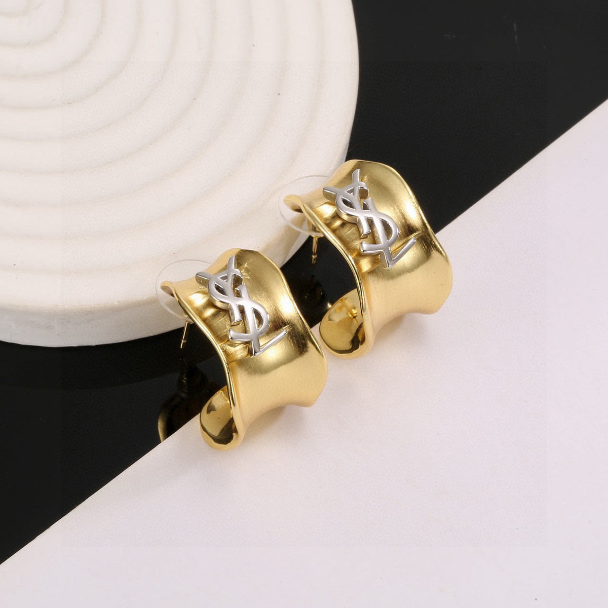 Martin Graham stud earrings in polished metal-tone – main product view