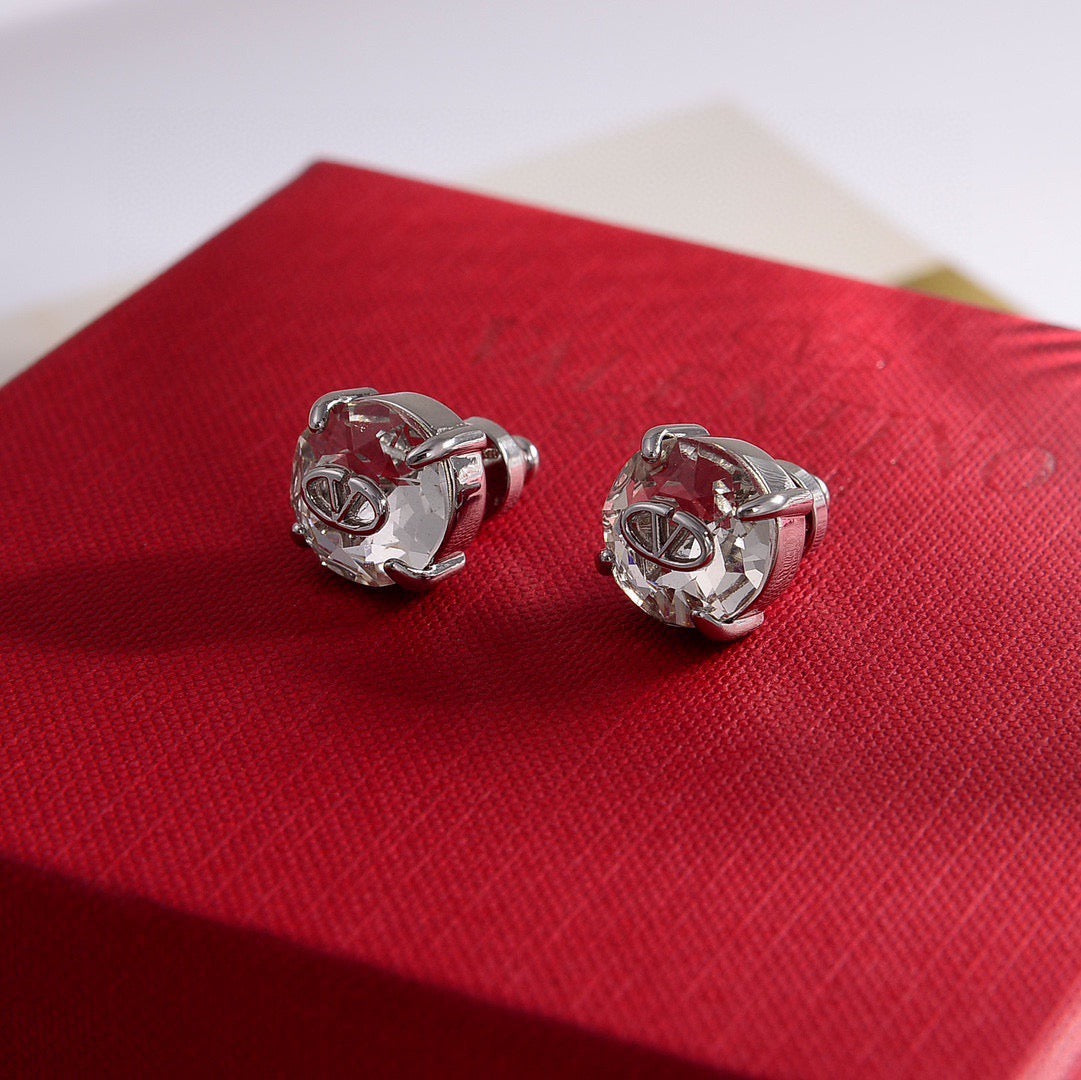 Martin Graham stud earrings in polished metal-tone – main product view