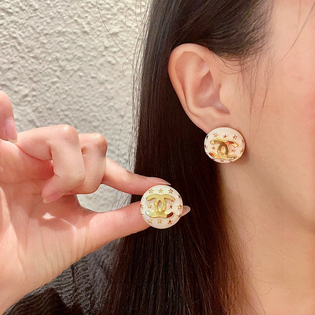 Martin Graham stud earrings in polished metal-tone – main product view