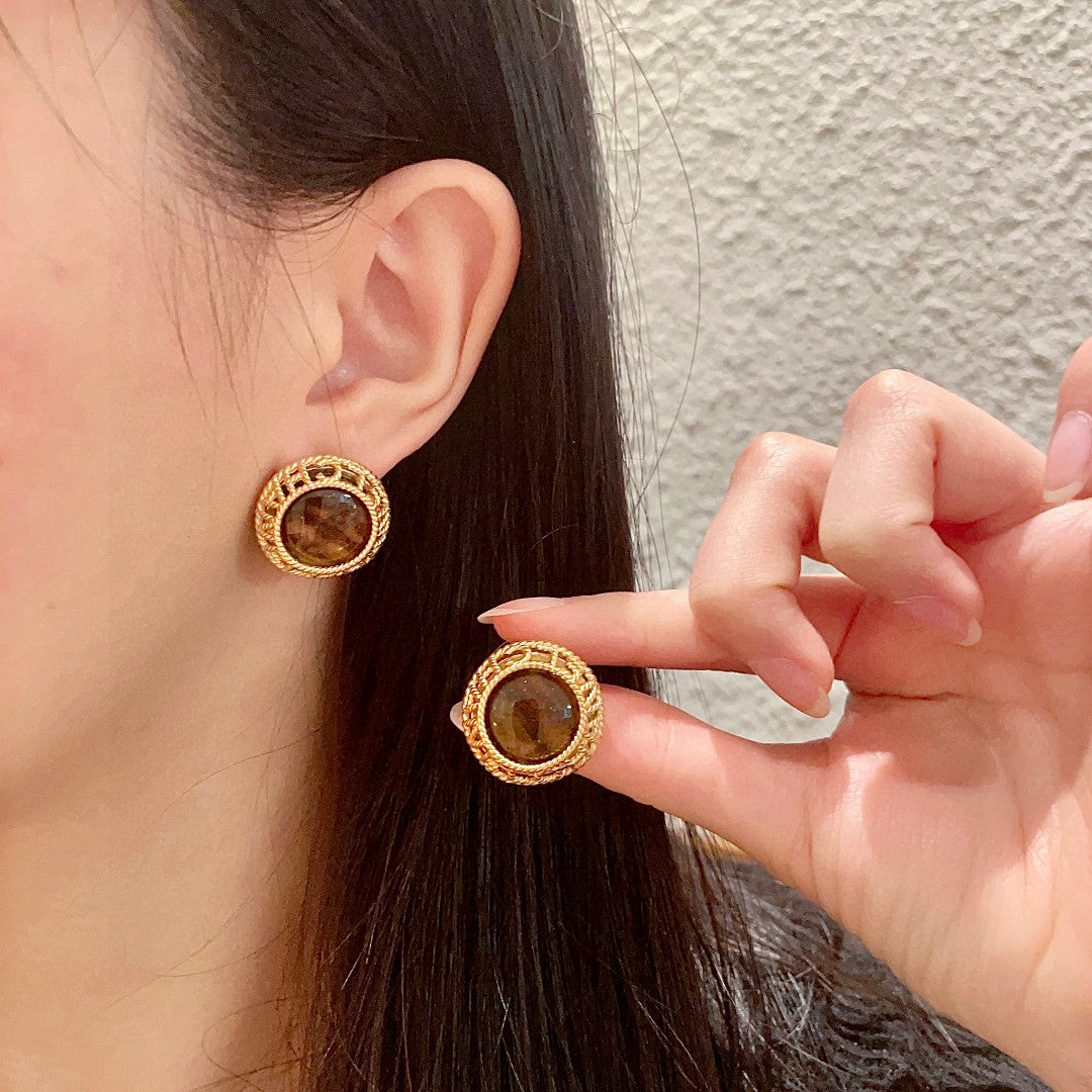 Martin Graham stud earrings in polished metal-tone – main product view
