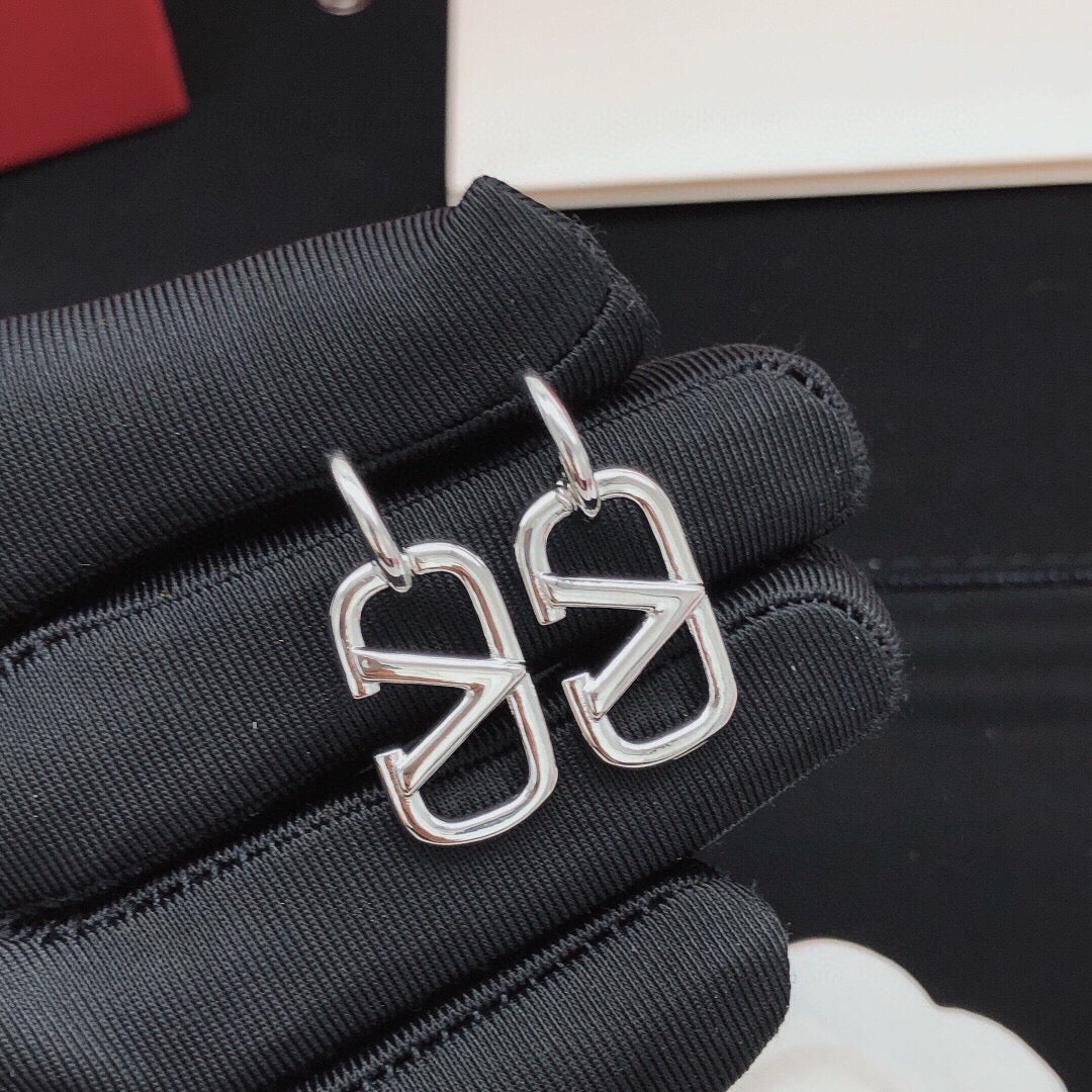 Martin Graham drop earrings in polished metal-tone – main product view