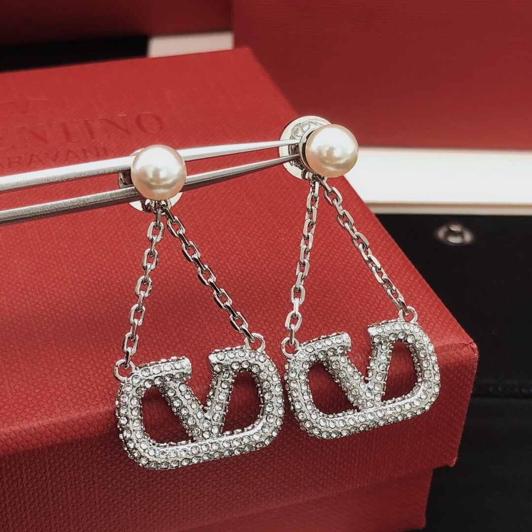 Martin Graham stud earrings in polished metal-tone – main product view
