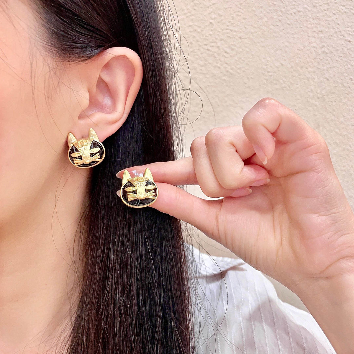 Martin Graham stud earrings in polished metal-tone – main product view