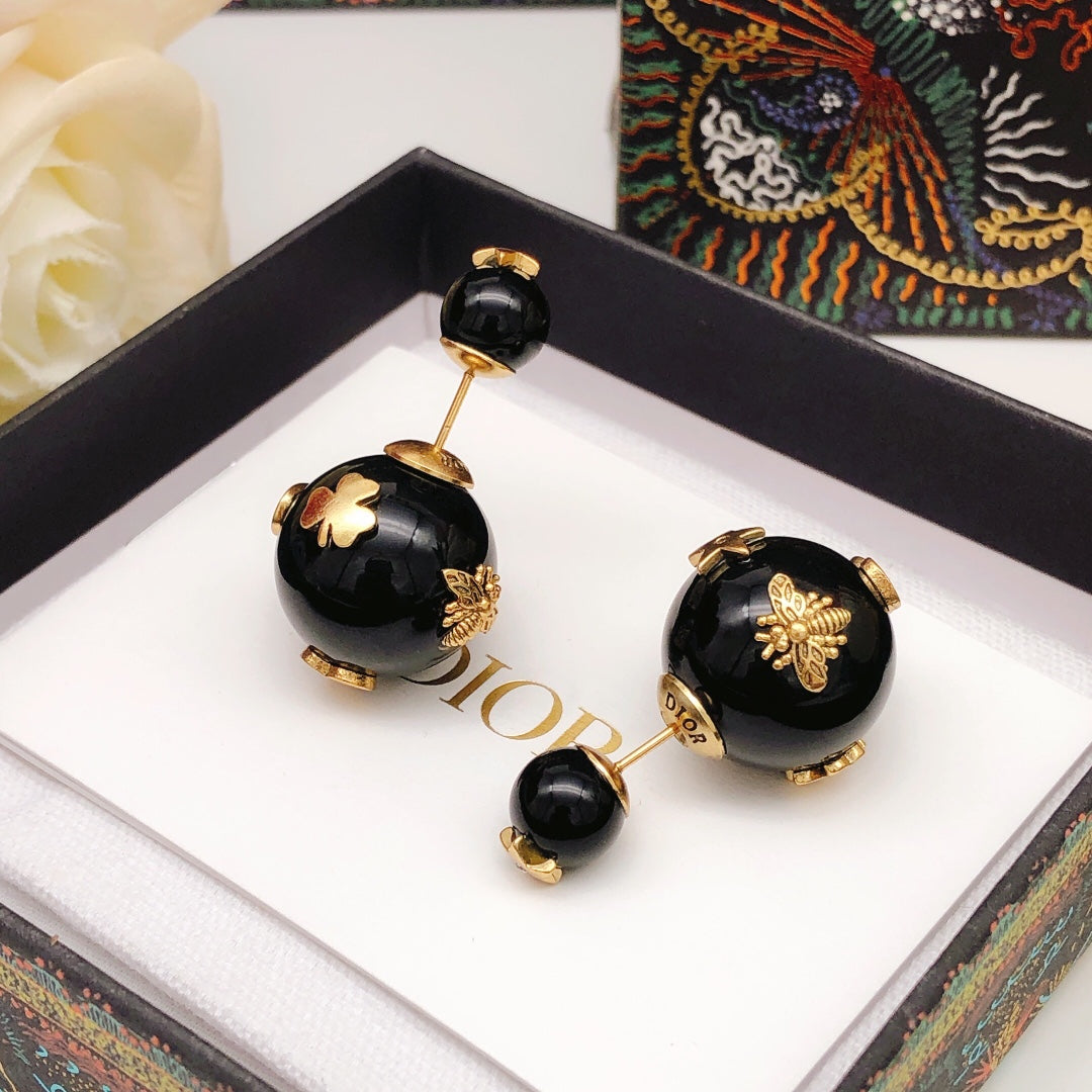 Martin Graham stud earrings in polished metal-tone – main product view