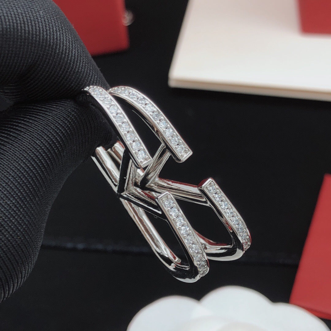 Martin Graham stud earrings in polished metal-tone – main product view