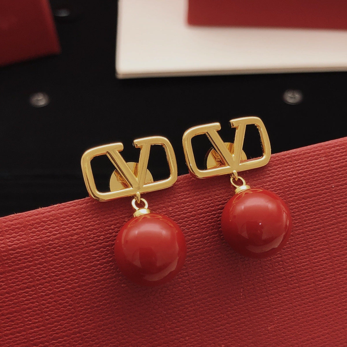 Martin Graham stud earrings in polished metal-tone – main product view