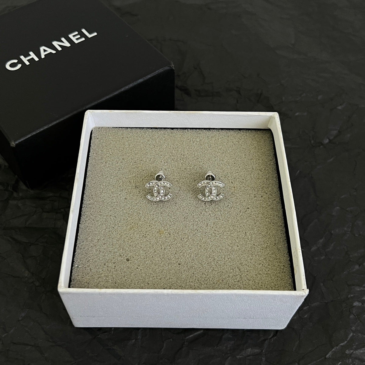 Martin Graham stud earrings in polished metal-tone – main product view