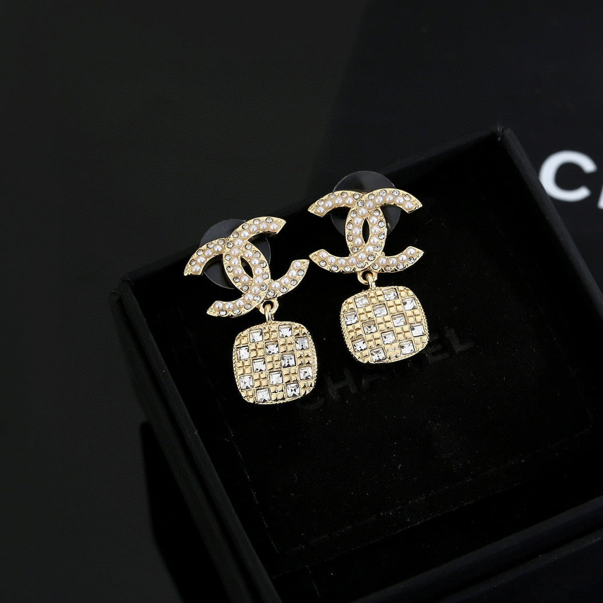 Martin Graham stud earrings in polished metal-tone – main product view