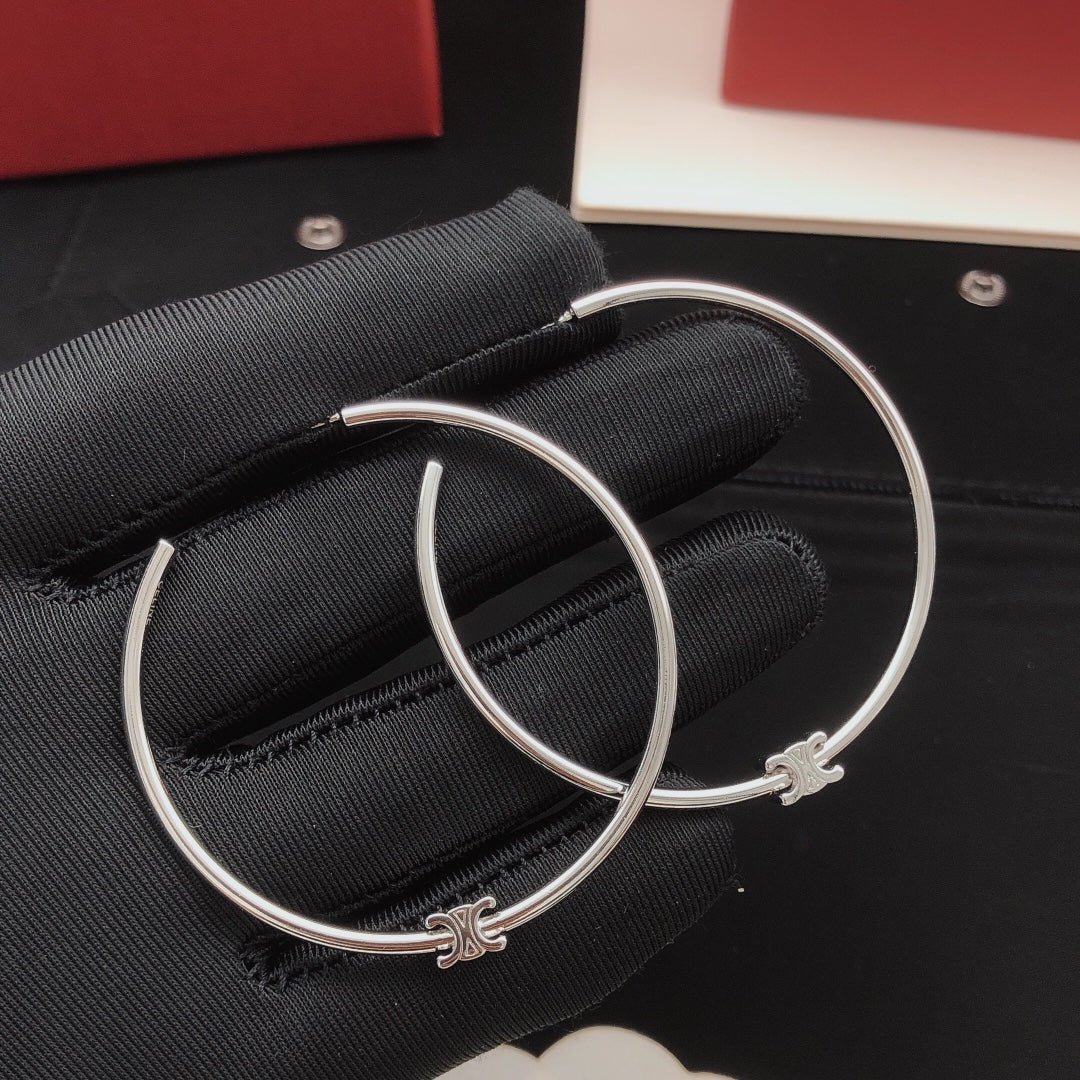 Martin Graham earrings in polished metal-tone – main product view