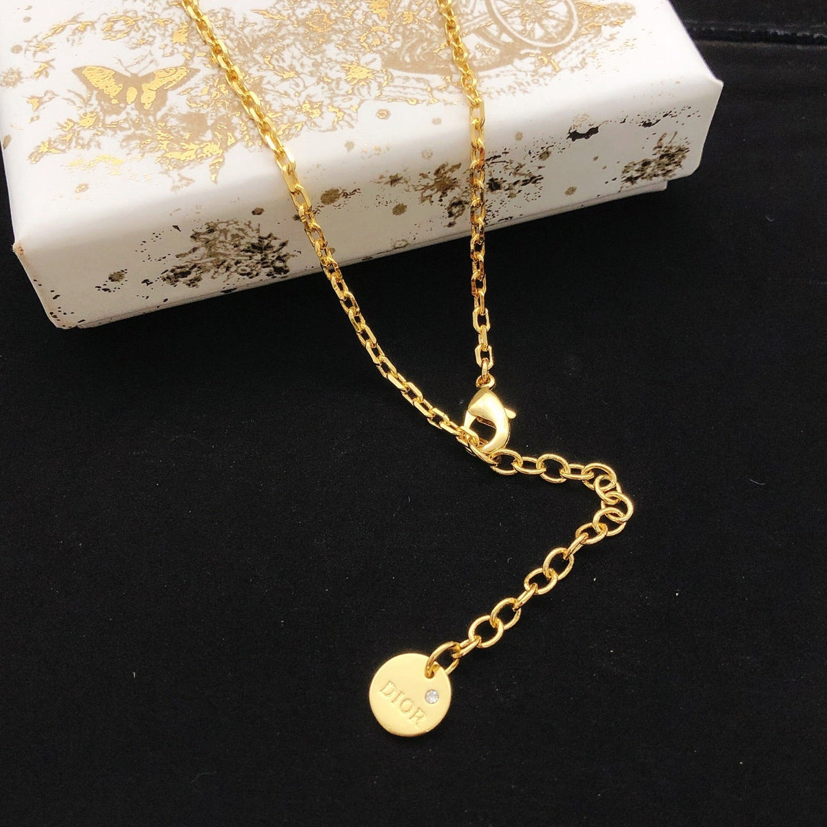 Martin Graham pendant necklace in polished metal-tone – front view