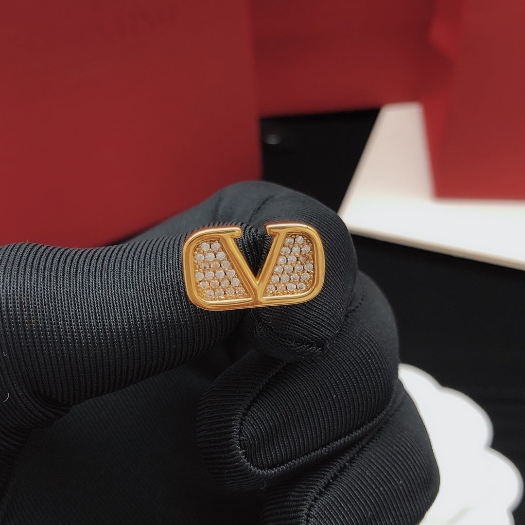 Martin Graham stud earrings in polished metal-tone – front view