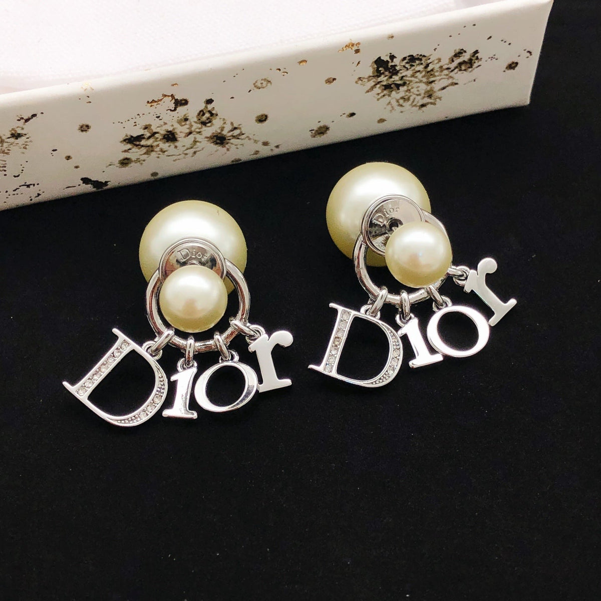 Martin Graham stud earrings in polished metal-tone – front view