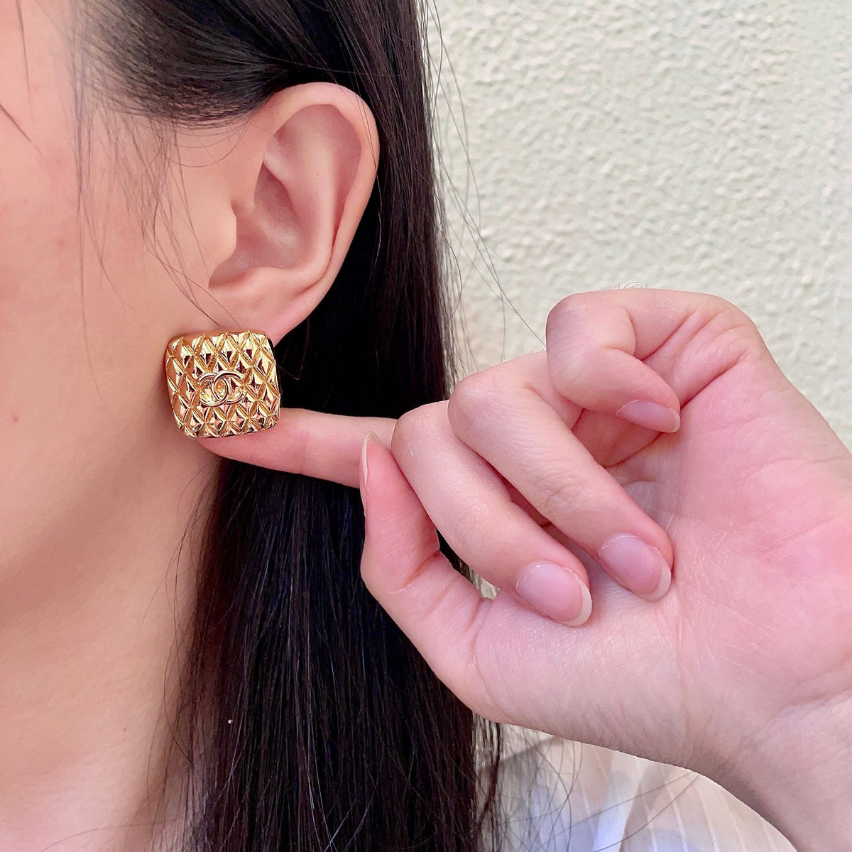 Martin Graham stud earrings in polished metal-tone – front product view