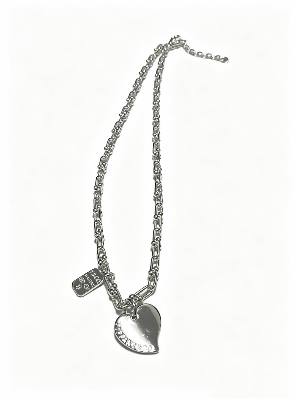 Martin Graham pendant necklace in polished metal-tone – front product view