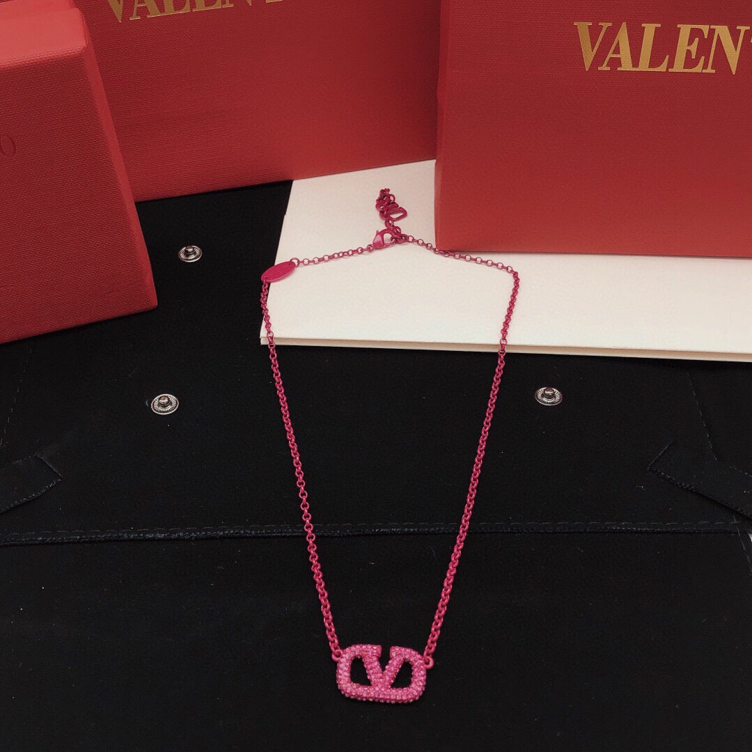 Martin Graham pendant necklace in polished metal-tone – front view