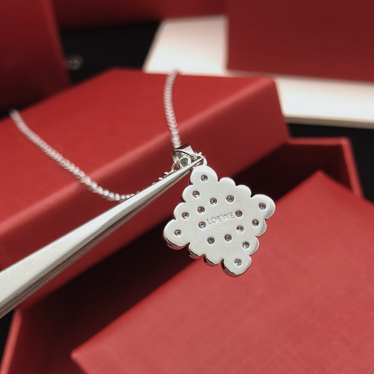 Martin Graham pendant necklace in polished metal-tone – front view