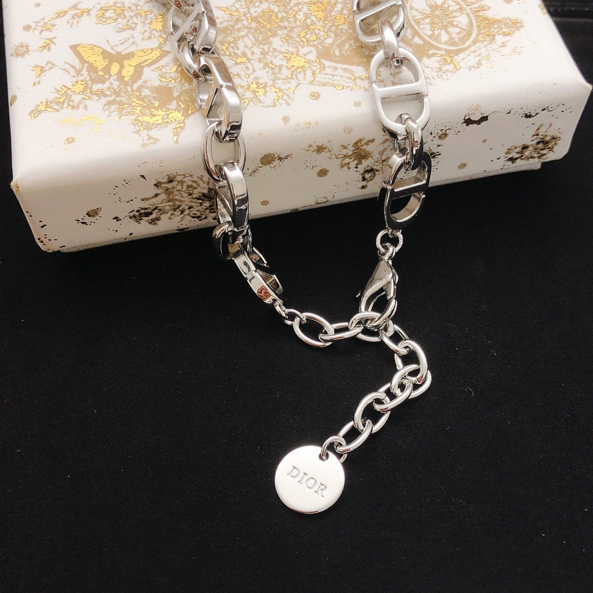 Martin Graham pendant necklace in polished metal-tone – front view