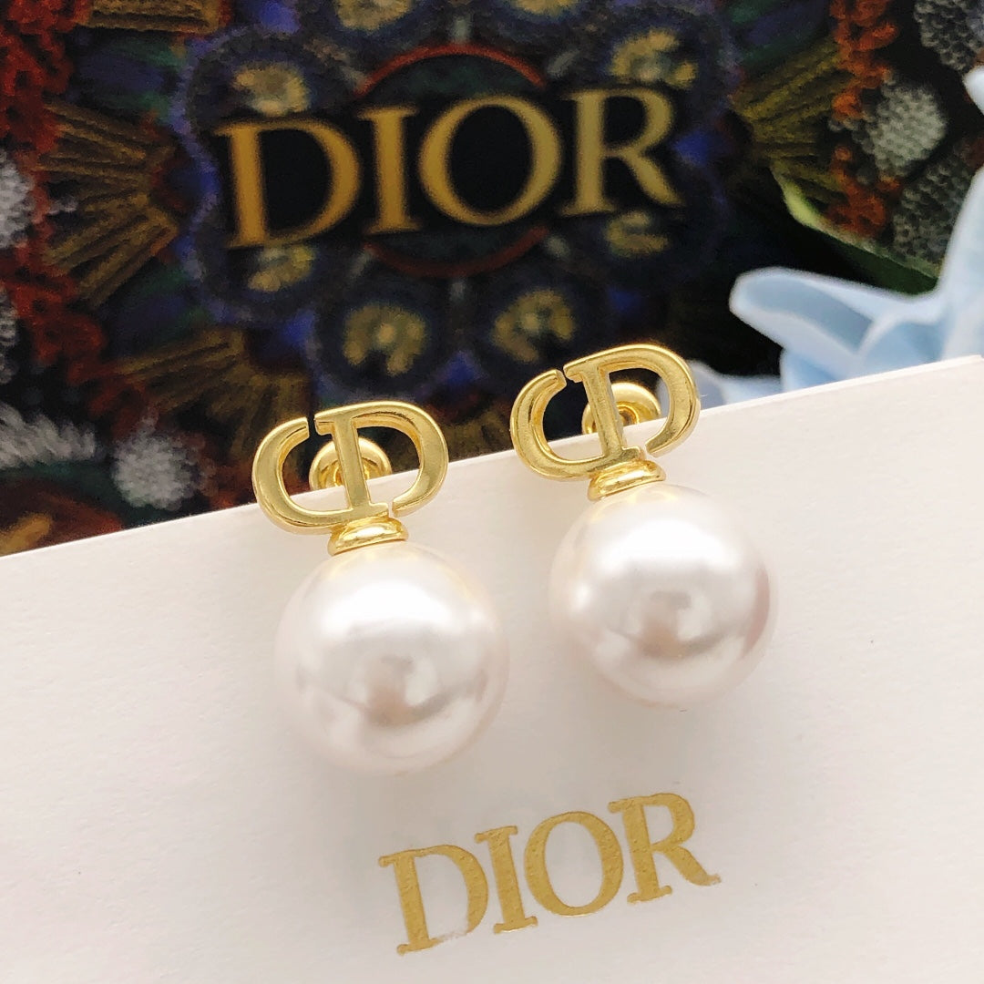 Martin Graham stud earrings in polished metal-tone – front view
