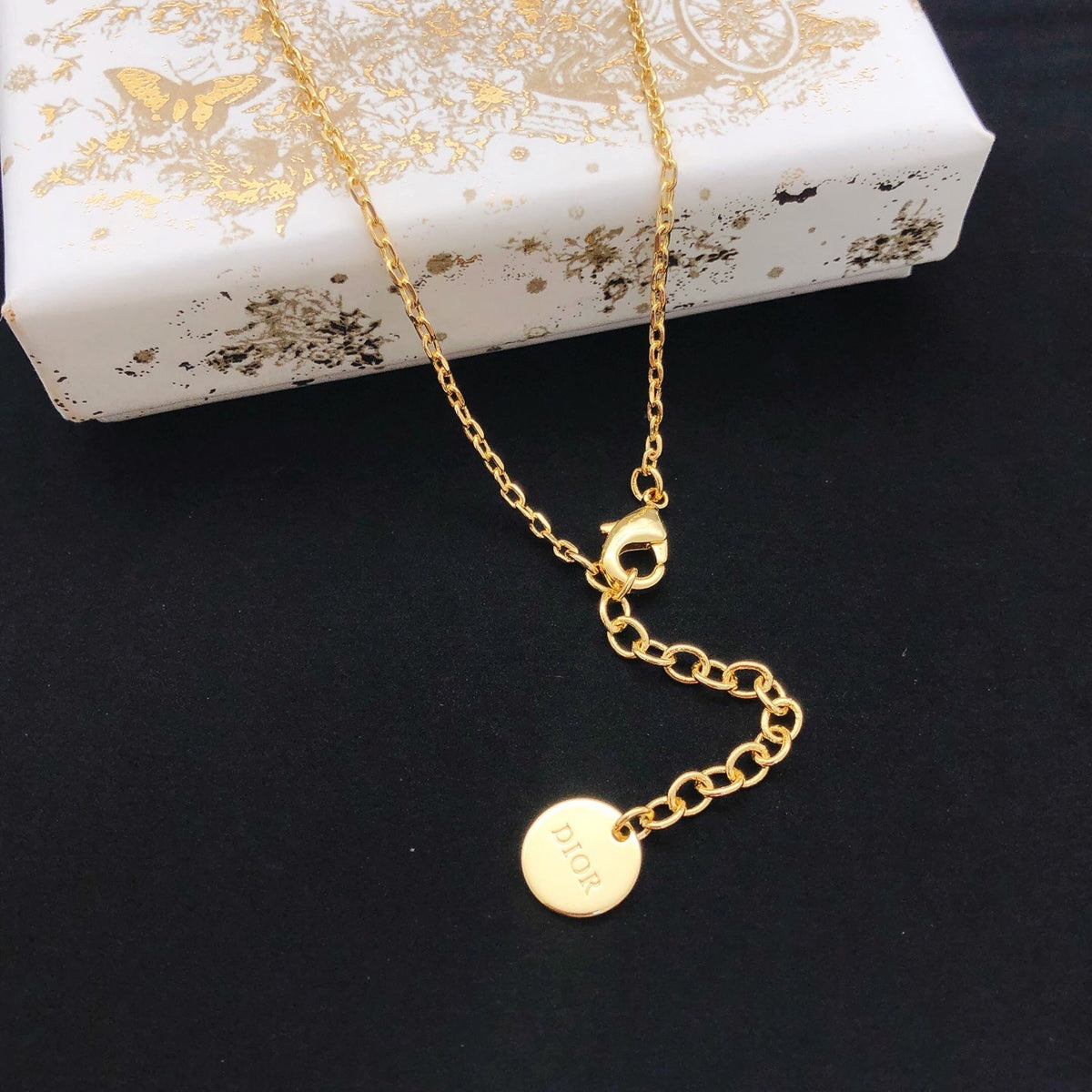 Martin Graham pendant necklace in polished metal-tone – front view