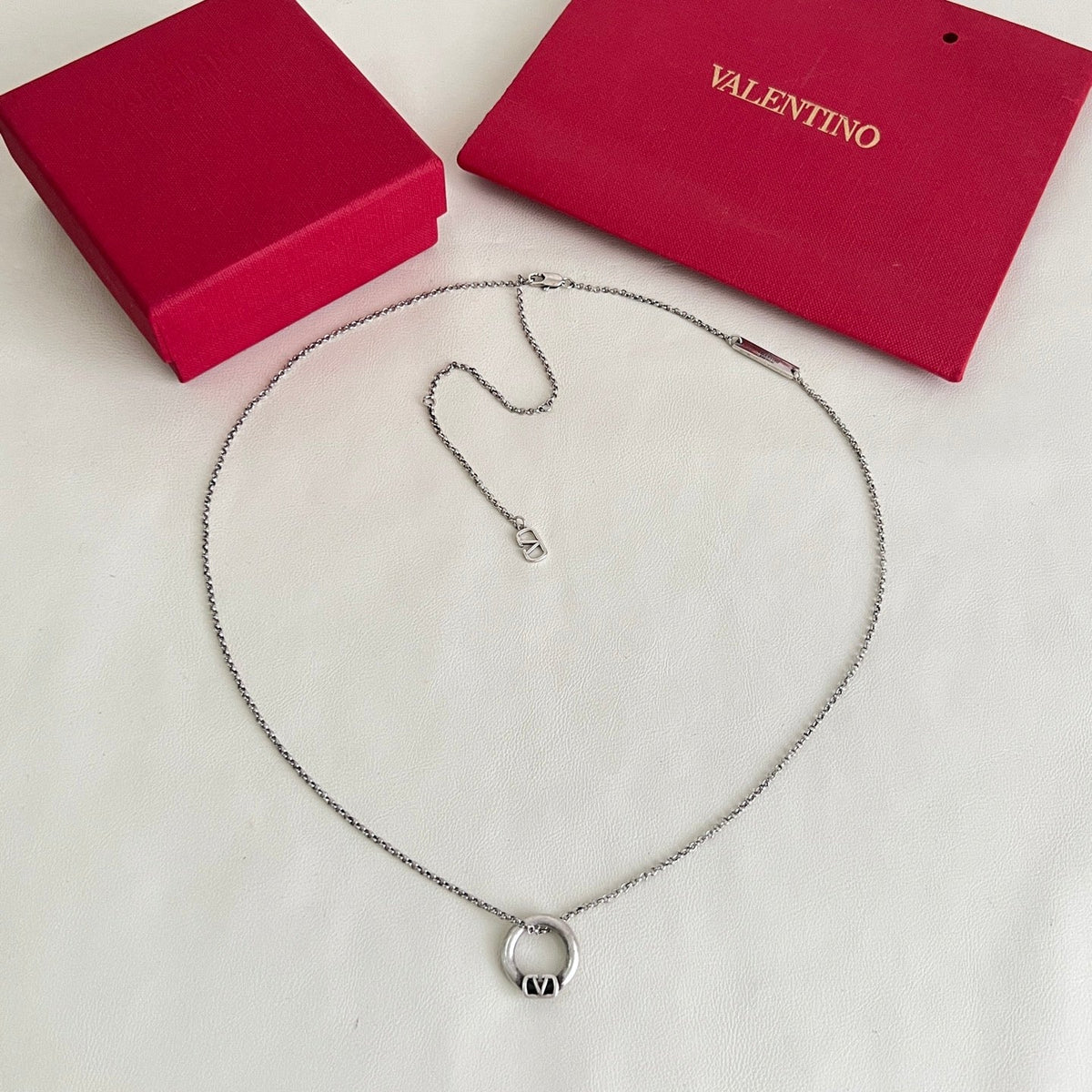 Martin Graham pendant necklace in polished metal-tone – front view