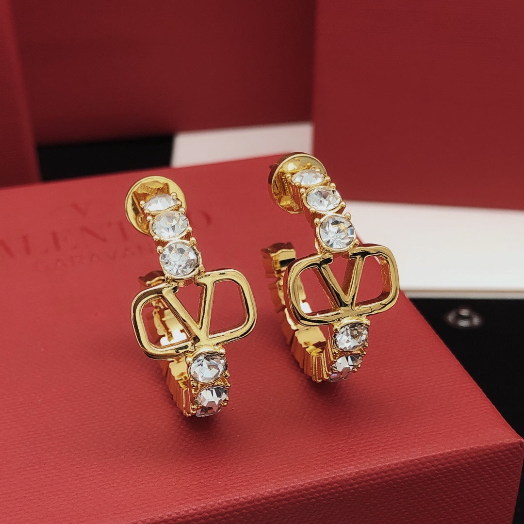 Martin Graham earrings in polished metal-tone – front view