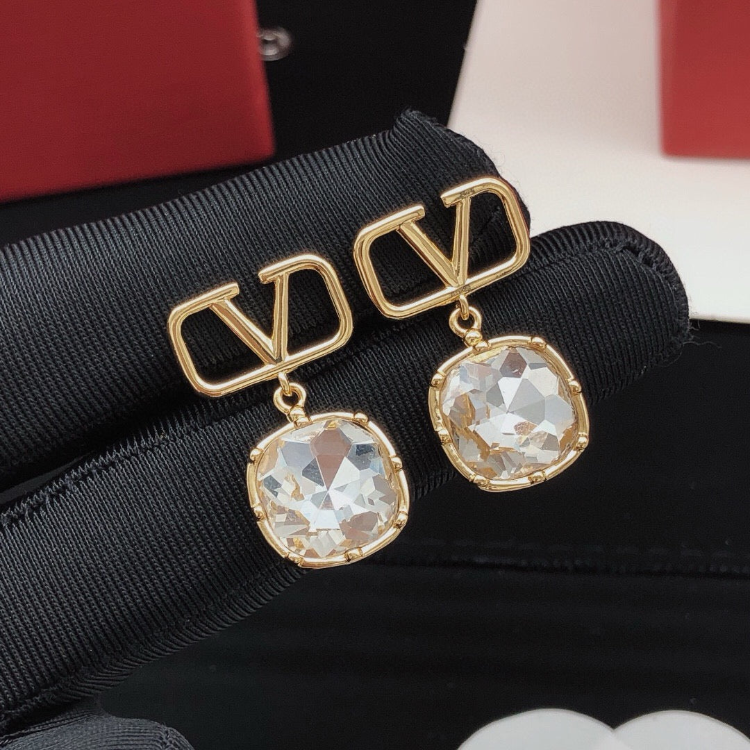 Martin Graham stud earrings in polished metal-tone – front view