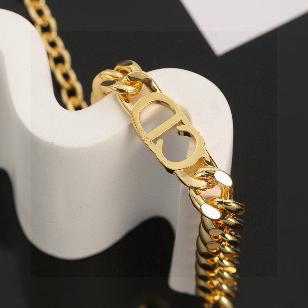 Martin Graham pendant necklace in polished metal-tone – front view
