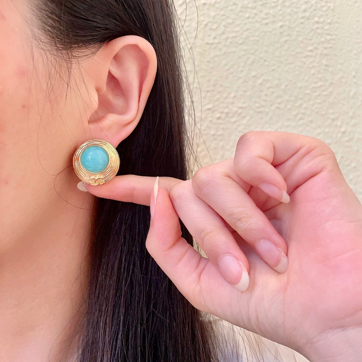 Martin Graham stud earrings in polished metal-tone – front product view