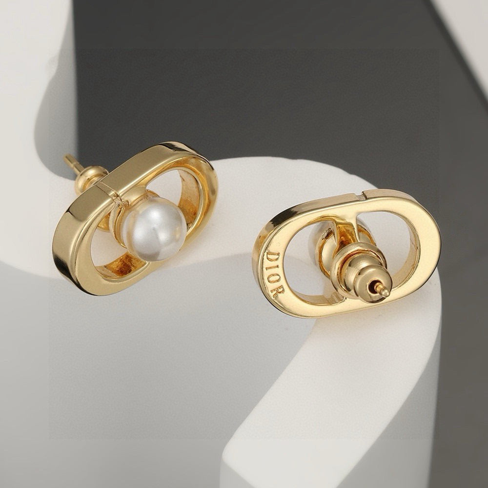 Martin Graham stud earrings in polished metal-tone – front view