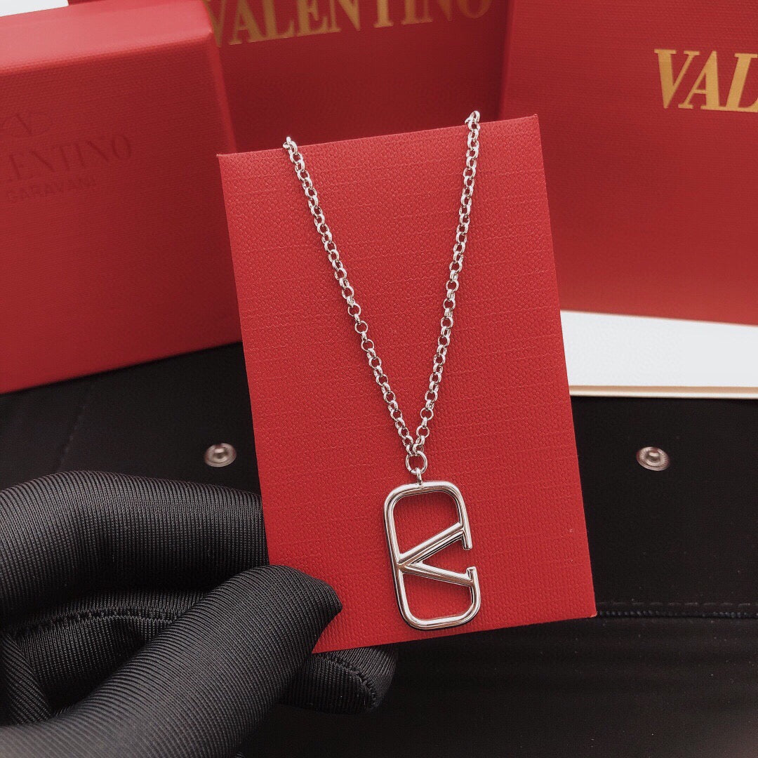 Martin Graham pendant necklace in polished metal-tone – front view