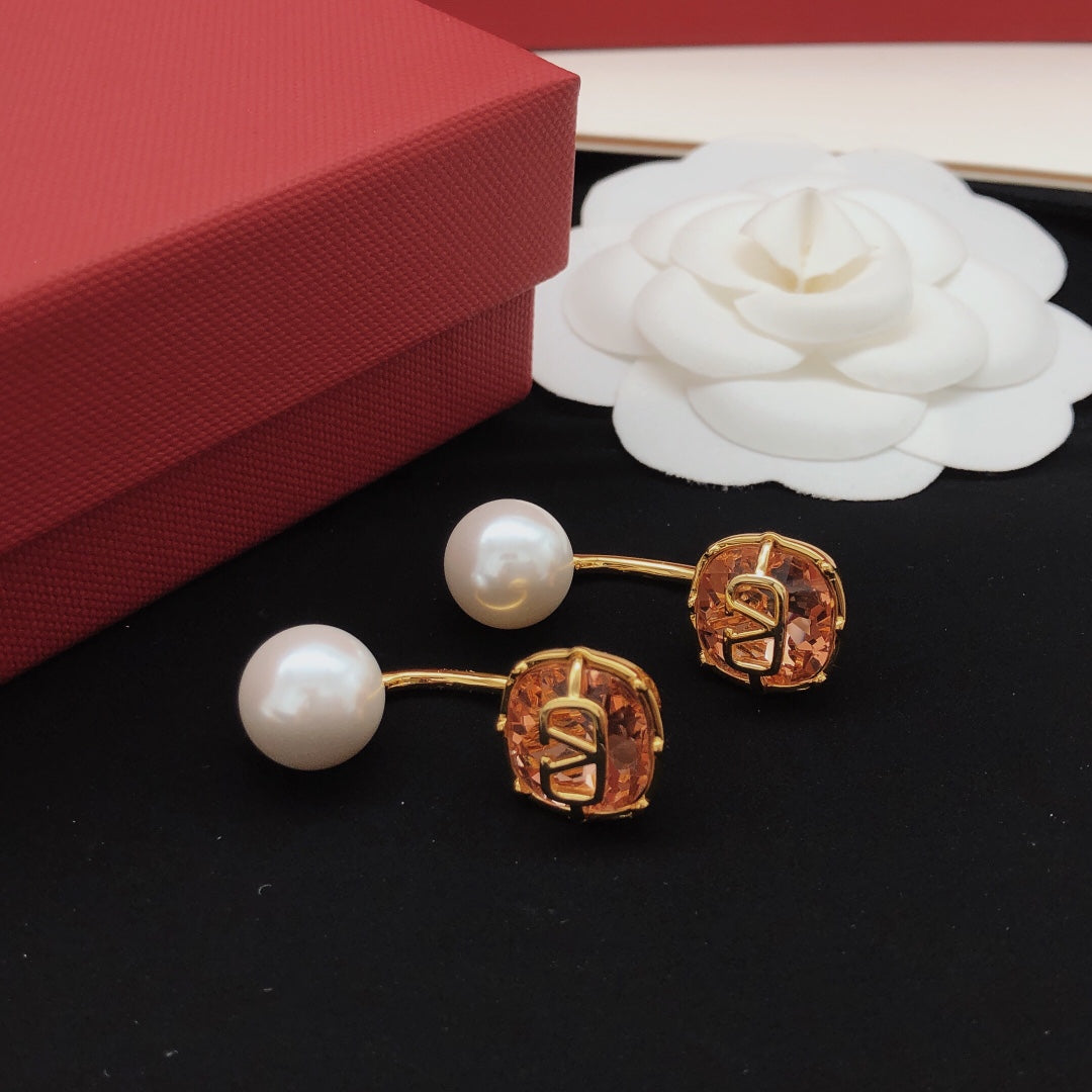 Martin Graham drop earrings in polished metal-tone – front view