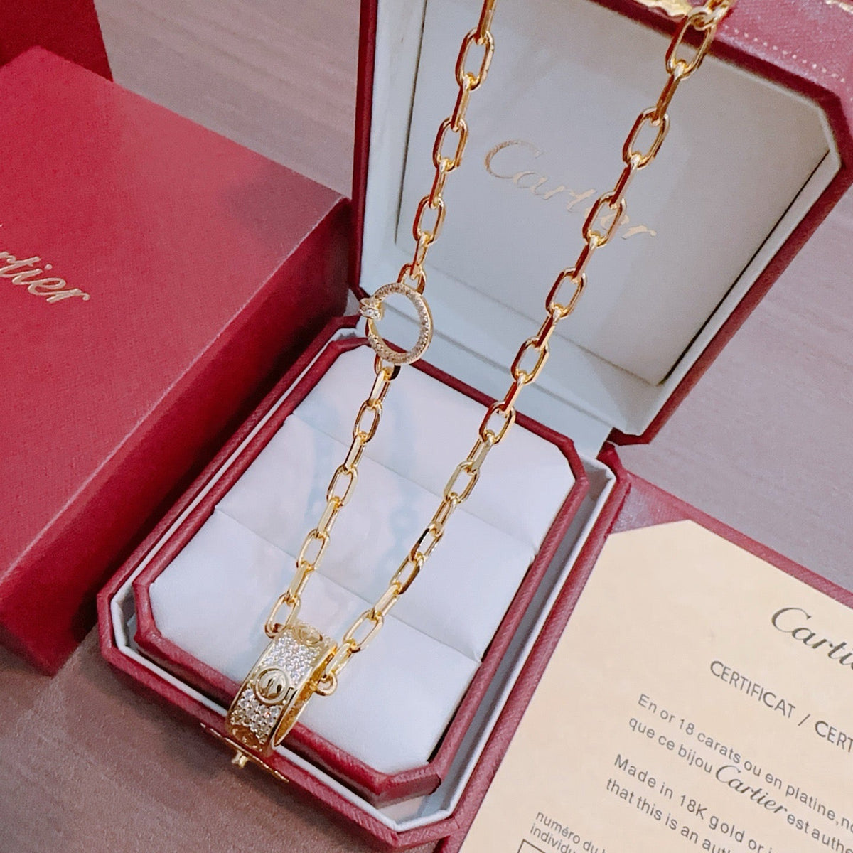 Martin Graham pendant necklace in polished metal-tone – front view
