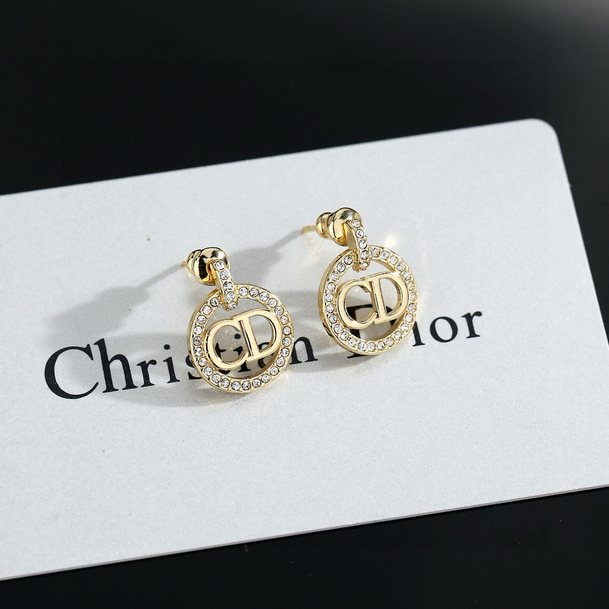 Martin Graham earrings in polished metal-tone – front view