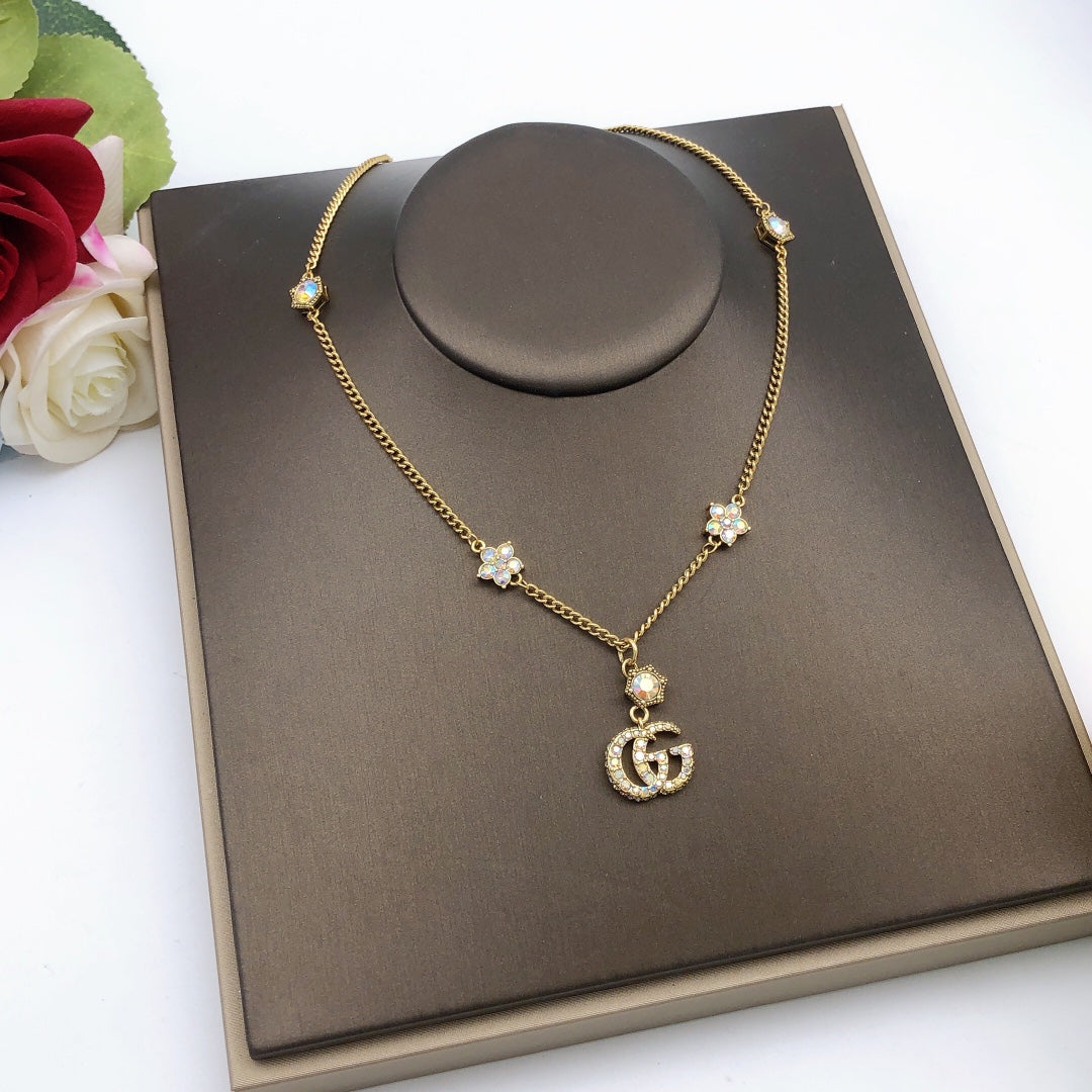 Martin Graham pendant necklace in polished metal-tone – front product view