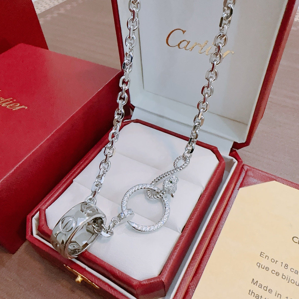 Martin Graham pendant necklace in polished metal-tone – front view