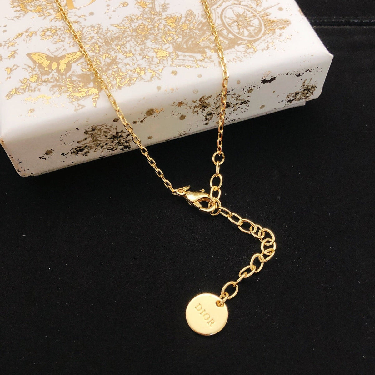 Martin Graham pendant necklace in polished metal-tone – front view