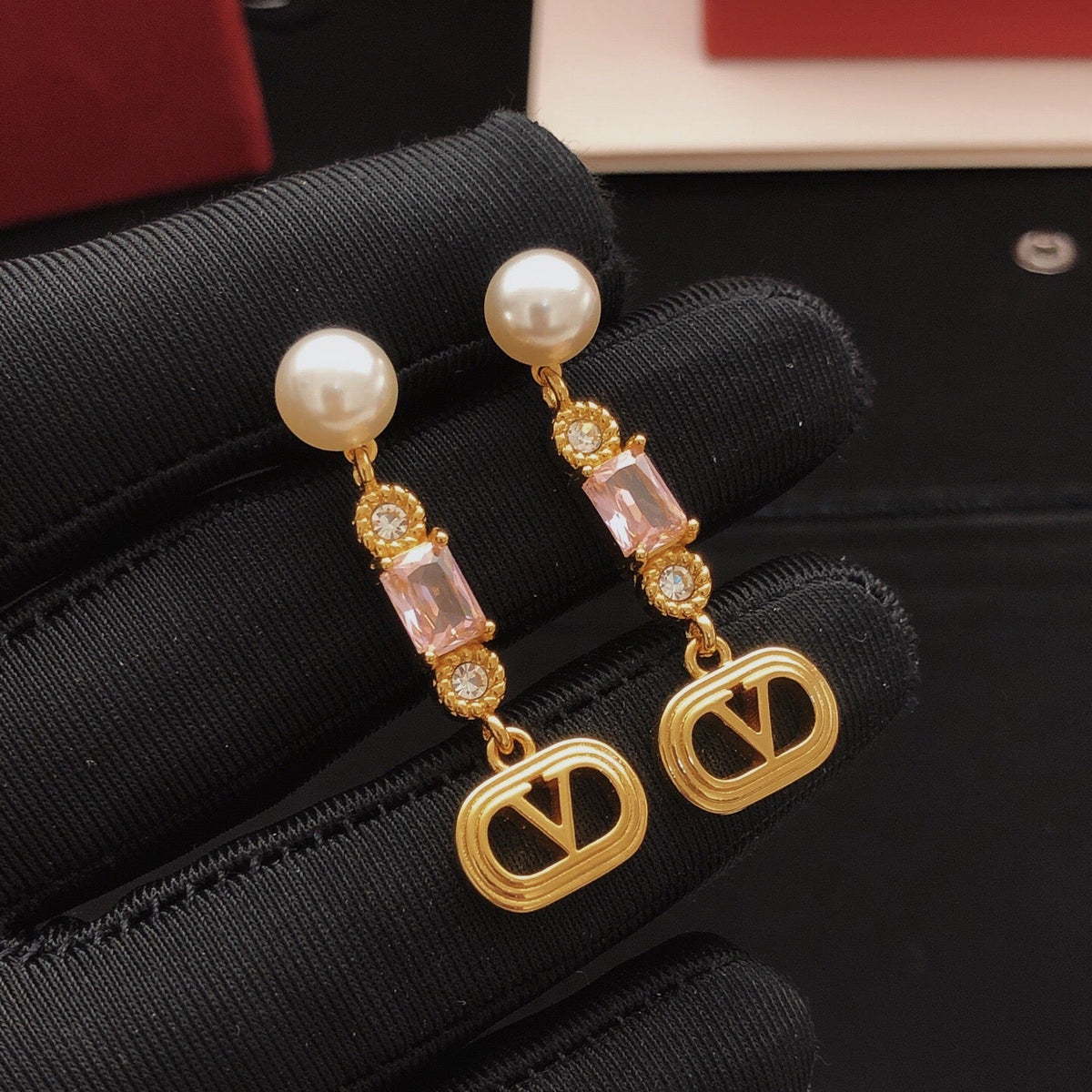Martin Graham stud earrings in polished metal-tone – front view
